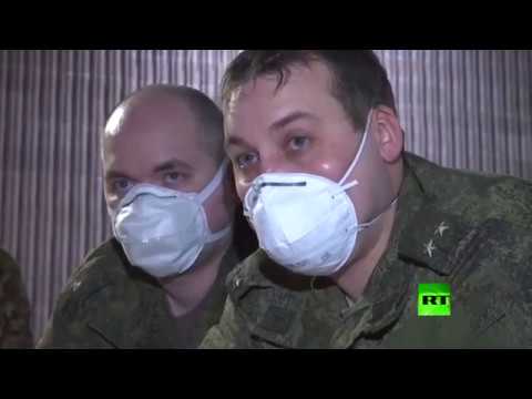 شاهد عسكريون روس يشاركون في تجهيز مستشفى ميداني في بيرغامو الإيطالية